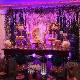 Custom wedding reception floral dessert set up